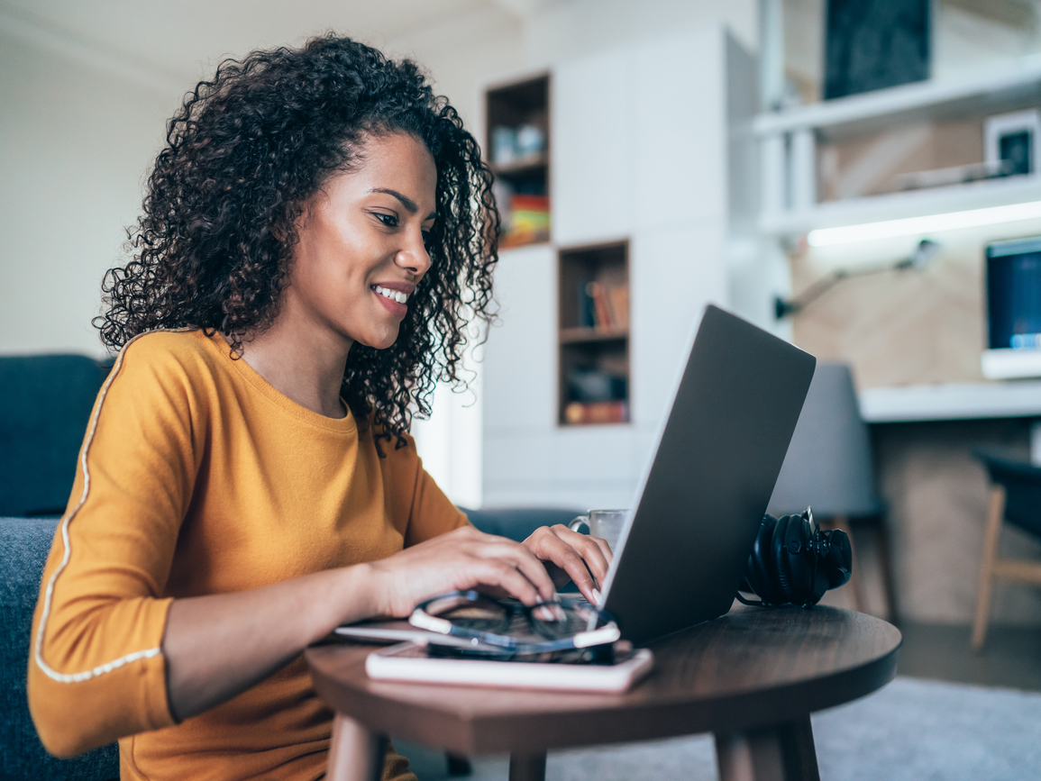 women at her laptop in home office