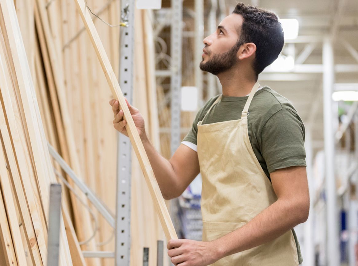 A man constructing a wall