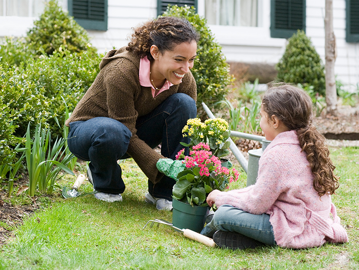 mother with daughter in the garden