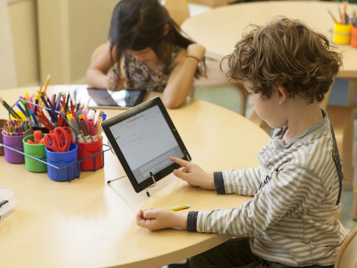 A child using a tablet at a tablet