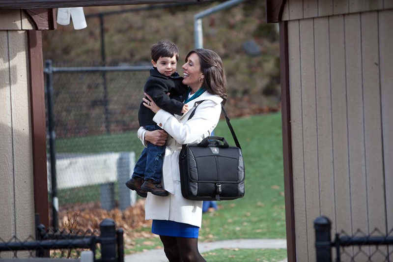 Mom dropping son off at back-up care center