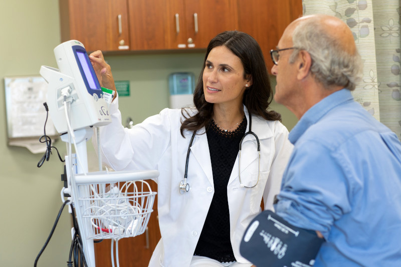 Doctor helping a patient in a hospital