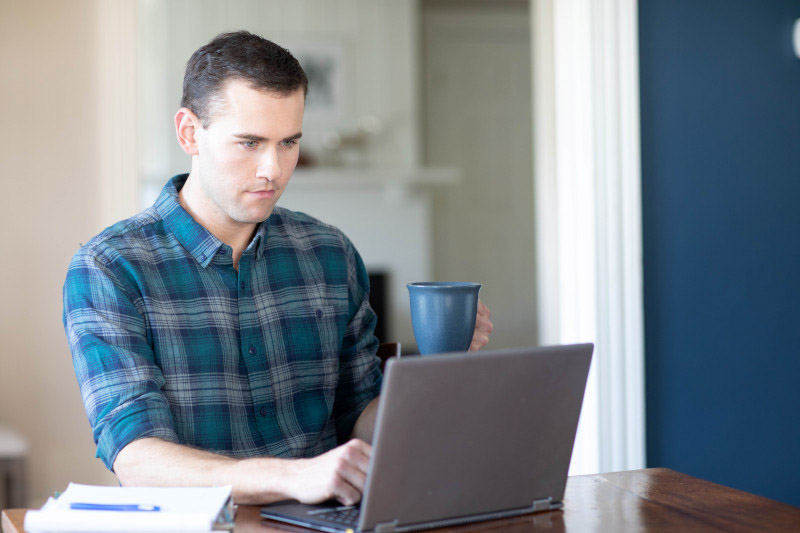 Employee studying for a degree from home