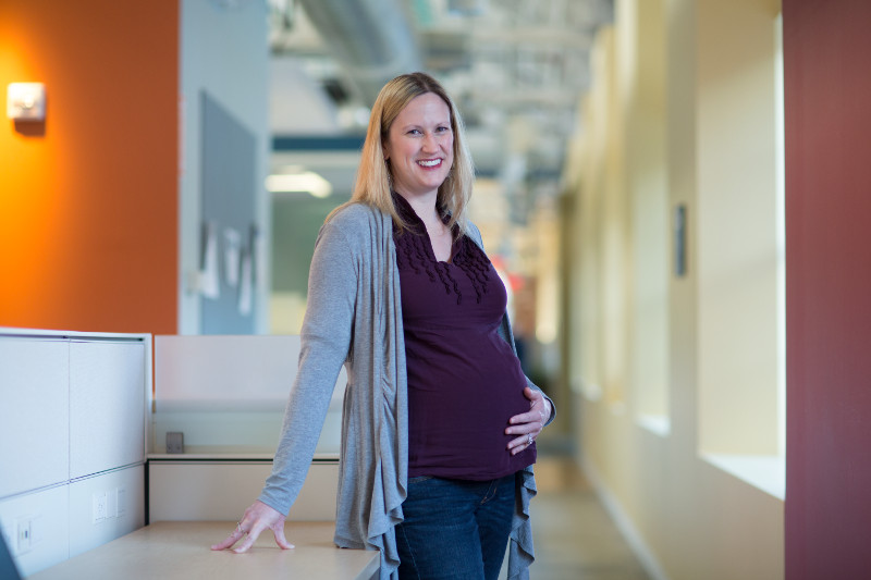 Pregnant employee at work