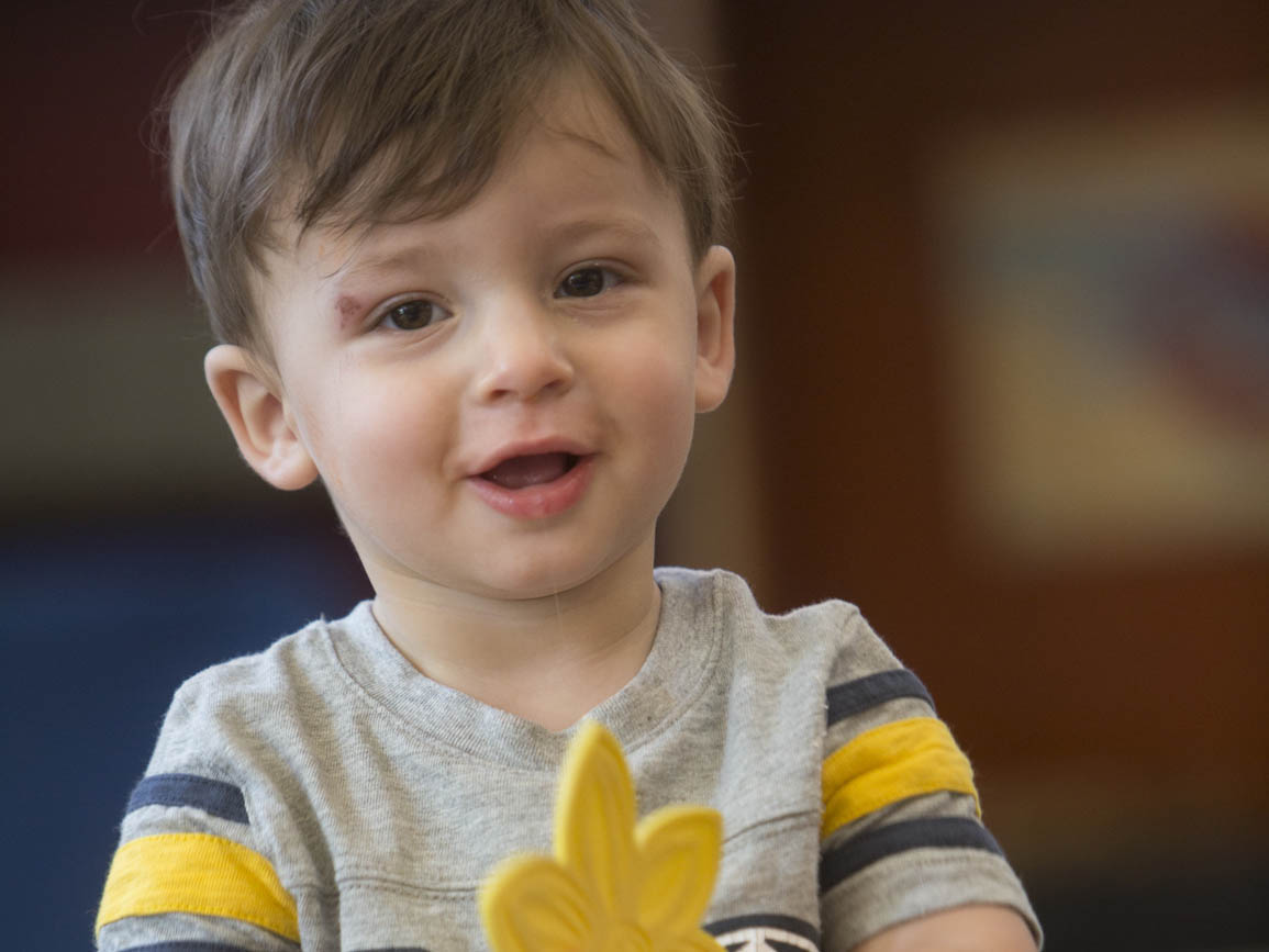 Toddler boy smiling