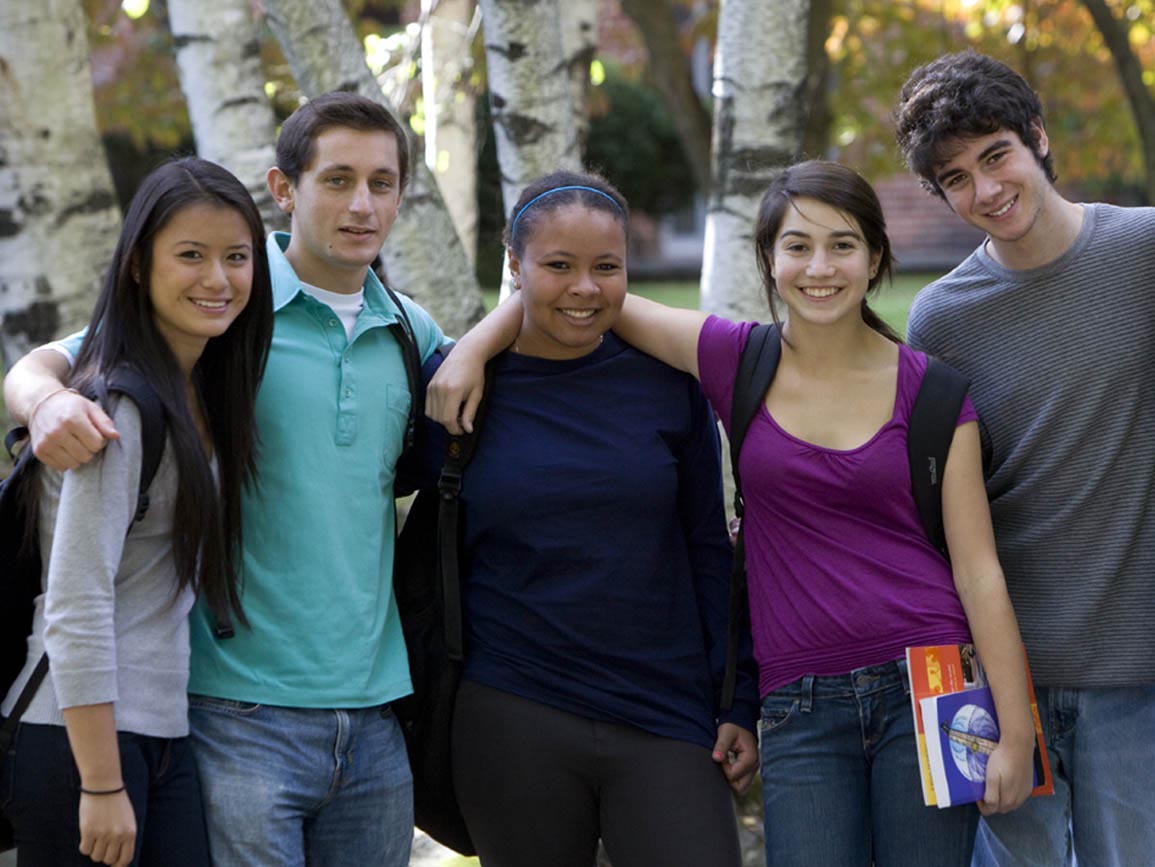 A group of teenagers posing together