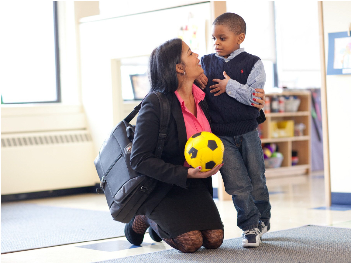 Woman dropping child off at center