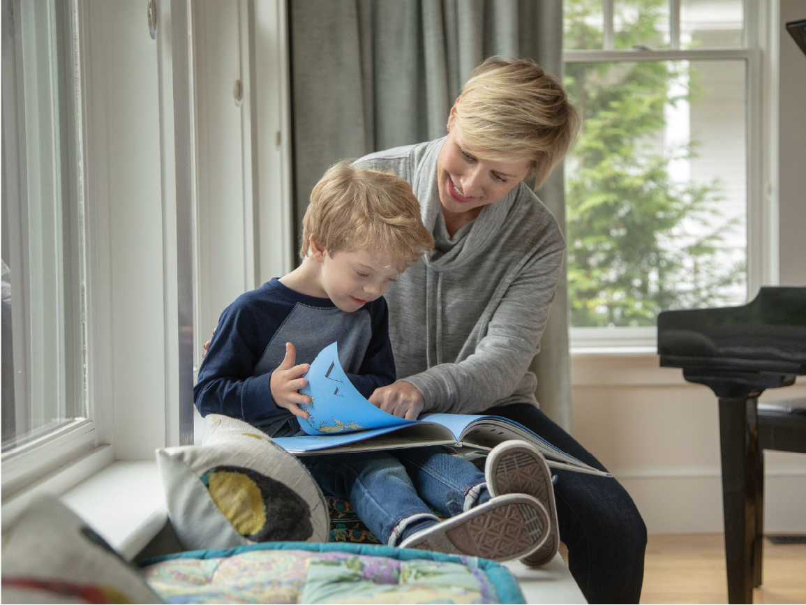 Child and woman reading