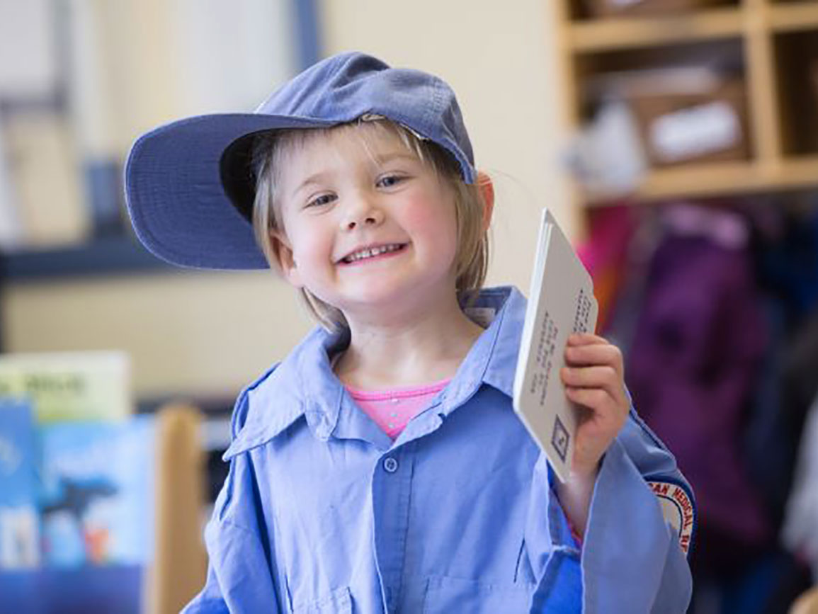 Preschooler delivering letters