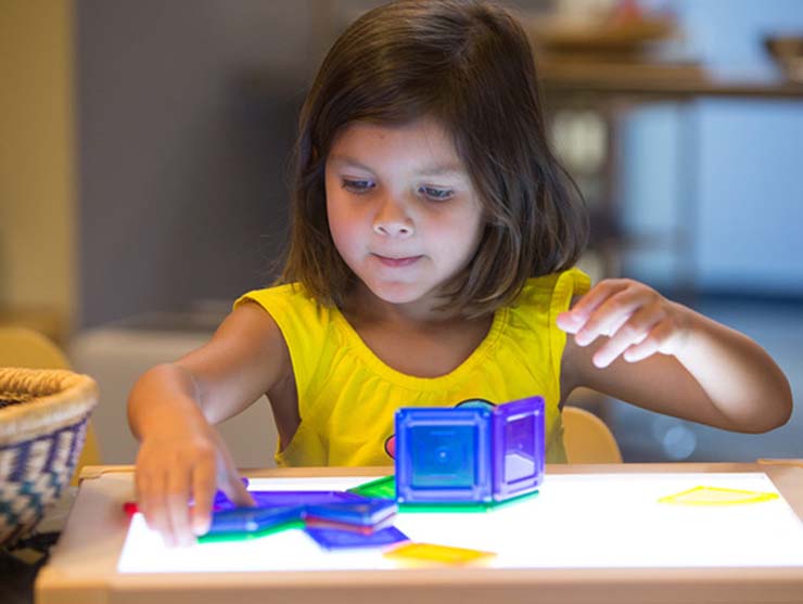 preschooler doing a STEM for girls activity